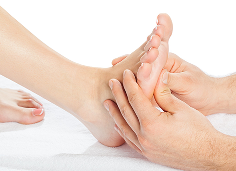 como fazer massagem nos pés